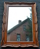 Mahagonispiegel, 
19. 
Jahrhundert. 
Dänemark. 
Verkrüppelte 
Listen. Höhe: 
90 cm. B: 66 
cm.