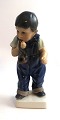 Dahl Jensen. 
Porzellanfigur. 
Junge mit 
Pfeife. Modell 
1027. Höhe 17 
cm. (1 Wahl)