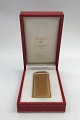 Cartier Lighter 
"Les must de 
Cartier" 
Goldplated Bark 
Finish 
Measures 7 cm 
x 2.5 cm x 1.3 
cm ...