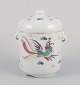 Chinese 
porcelain 
container with 
two lids.