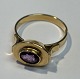 Rotgoldring mit 
Amethyst, 20. 
Jahrhundert. 
Dänemark. 
Gestempelt. 
Größe: 54/55. 
Gewicht: 3,3 
Gramm.