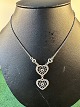 Collier aus 
Sterlingsilber 
925 s, 
ausgelegt für 2 
große Herzen, 
Länge 44cm