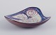 Michael Andersen, Bornholm.Hand-glazed ceramic dish.Motif of a bird.Glaze in blue, ...