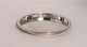 P. Hertz. 
Flaschentablett 
aus 
Sterlingsilber 
(925). 
Durchmesser 11 
cm.