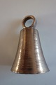 Eine alte 
kleine Glocke
Aus Messing
Mit ein 
schönem Klang
H: 5cm
In gutem 
Zustand
Sehen Sie ...