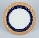 Meissen, 
Germany. 
Decorative 
plate in 
porcelain.
