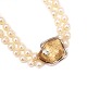 Ole Lynggard Schliesse aus 14kt Gold mit einem Brillanten von etwa 0,1ct. 
Grösse: 20x20mm