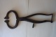 An antique 
sugar candy 
pair of tongs
Handmade of 
iron
L: 27cm
About 1850
In a good ...