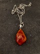 Amber pendant 
4.2 x 2.6 cm. 
and sterling 
silver chain 56 
cm. item no. 
615313
