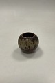 Royal 
Copenhagen 
Stoneware Vase 
in Sung Glaze
Measures 6,7cm 
/ 2.64 inch