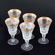 Five crystal 
glasses with 
gilt rim, 
mid-20th 
century.
