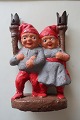 2 gamle 
lysestager i 
form af 
nissefar og 
nissemor med 
lysetager som 
fakler (lavet 
af ...