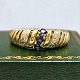 Ring in 14k gold set with sapphires and diamonds
