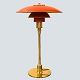 Poul Henningsen; PH 3/2 table lamp, with red lacquered shade