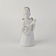 Figur med motiv af en engel som spiller på guitar. Figuren er i hvidt porcelæn med forgyldte ...