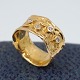 Henning Skovgaard; Bred ring i 14 kt. guld, prydet med fire diamanter, i alt 0.20 ct. Ring str. ...