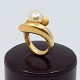 Ole Lynggaard; Ring of 14k gold set with a pearl