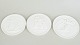 Royal Copenhagen, set of three biscuit wall plaques ...