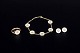 Georg Jensen and Bernhard Hertz, Daisy set in gilt ...