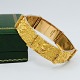Lapponia; Wide bracelet in 14k gold