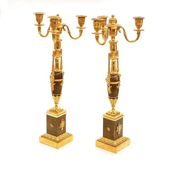 A pair of fire gilt bronze candelabra. France circa 1810. H: 48cm