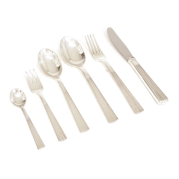 Jens Harald Quistgaard, Denmark: Champagne silver cutlery for 12 persons. (73)