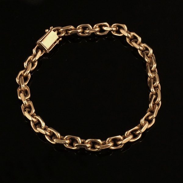 Anker armbånd i 14kt guld. Ledstørrelse: 8x6mm. L: 19,7cm. V: 21,9gr