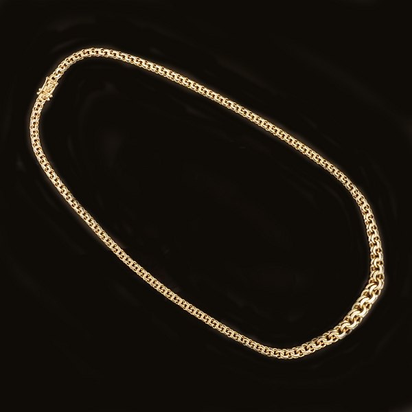 14kt gold necklace by Bremer Jensen, Randers, Denmark. L: 48cm. W: 4-8mm. W: 
27gr