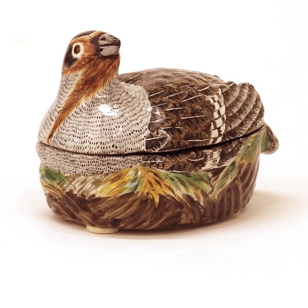 Polychrome Rococo faience tureen in the shape of a partridge. Signed, Marieberg, 
Sweden, circa 1770. H: 9,5cm. L: 16cm