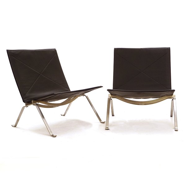 Pair of Poul Kjærholm PK22 lounge chairs with black leather and steel frame